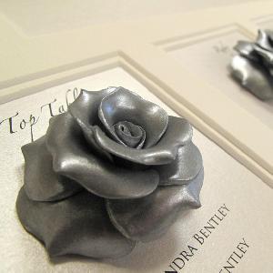 A ‘breathtaking’ Multi Aperture couture table plan using silver handmade roses – a show stopping table plan